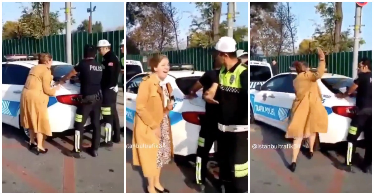 Mulher grita de forma histérica diante da polícia após ser apanhada sem carta
